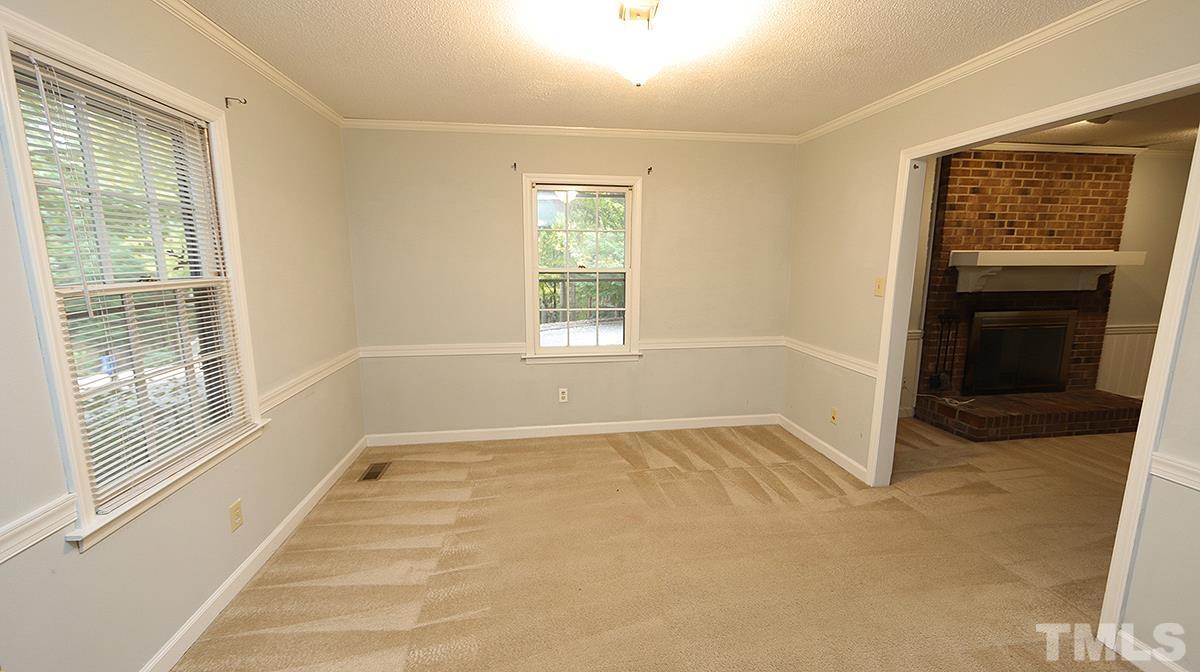 7300 Mill Ridge Road Raleigh, NC 27613 - Photo 8 of 25 a view of an empty room with a window