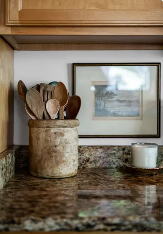 a bedroom with two beds and painted walls