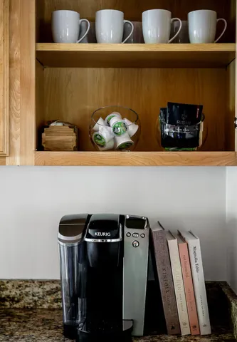 a bedroom with two beds and a couch