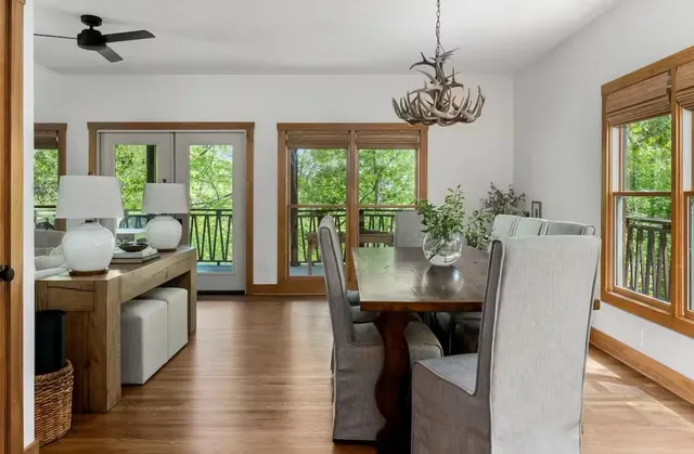 a kitchen with stainless steel appliances a stove a microwave and a refrigerator