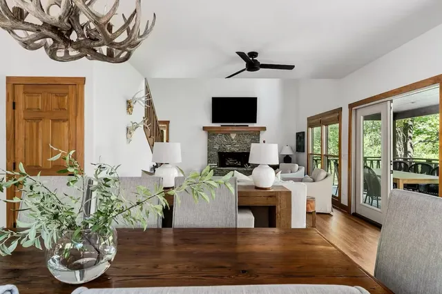 a living room with couch and a table