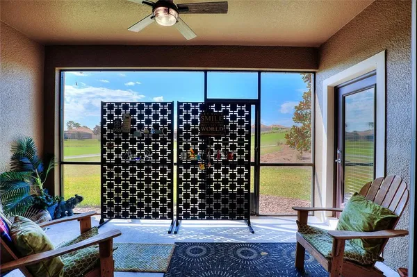 a room with a table and a potted plant