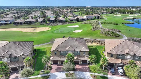 an aerial view of a house with a garden