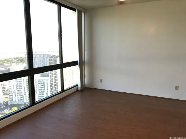 an empty room with windows