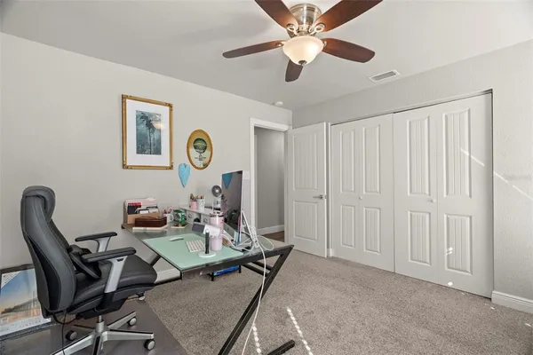 a view of a livingroom with furniture