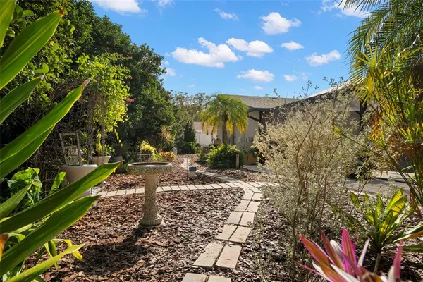 a view of a swimming pool with a lounge chairs
