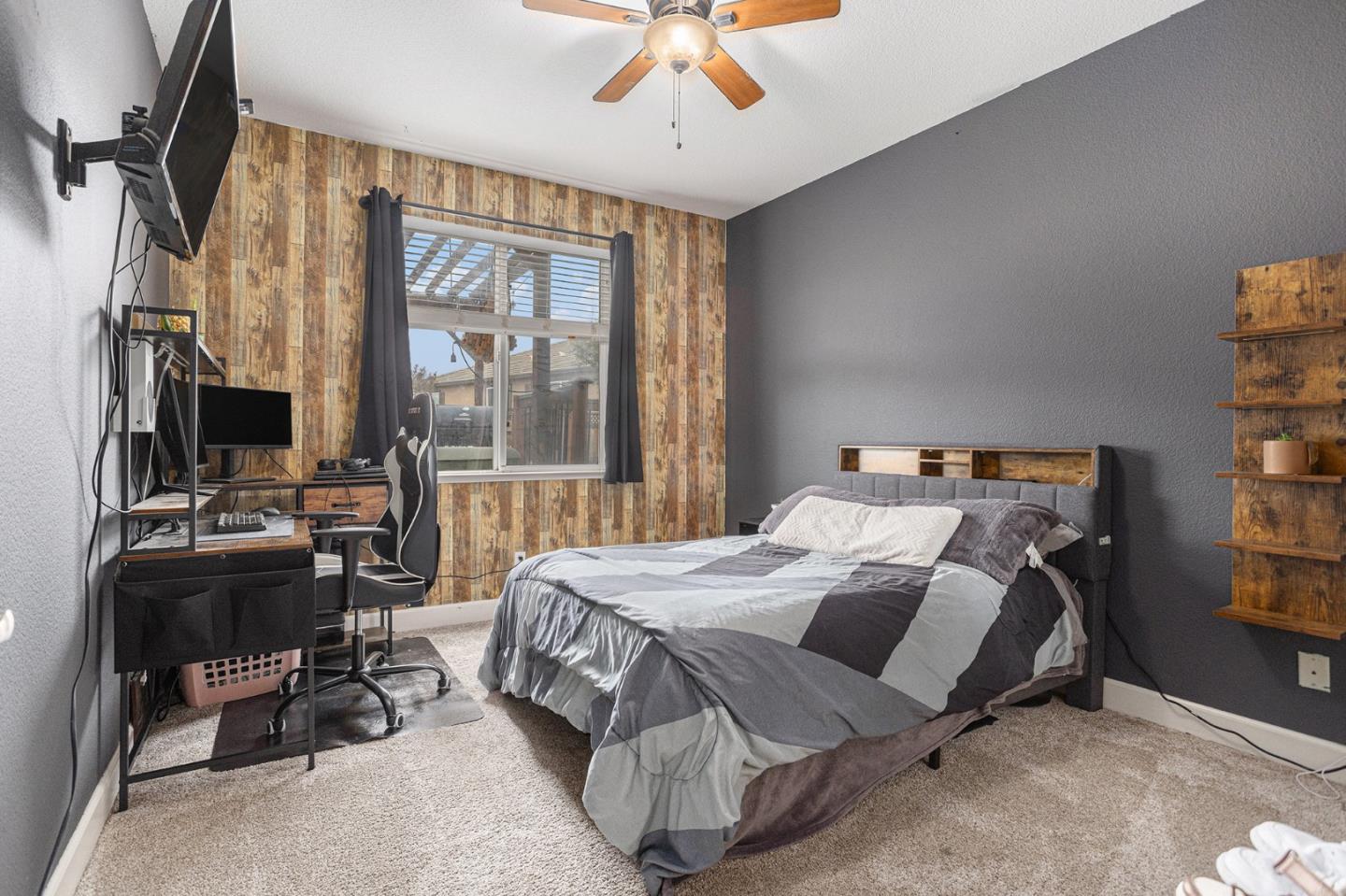 130 Ridge Crest Court Oakley, CA 94561 - Photo 19 of 59 a bedroom with a bed and a chandelier