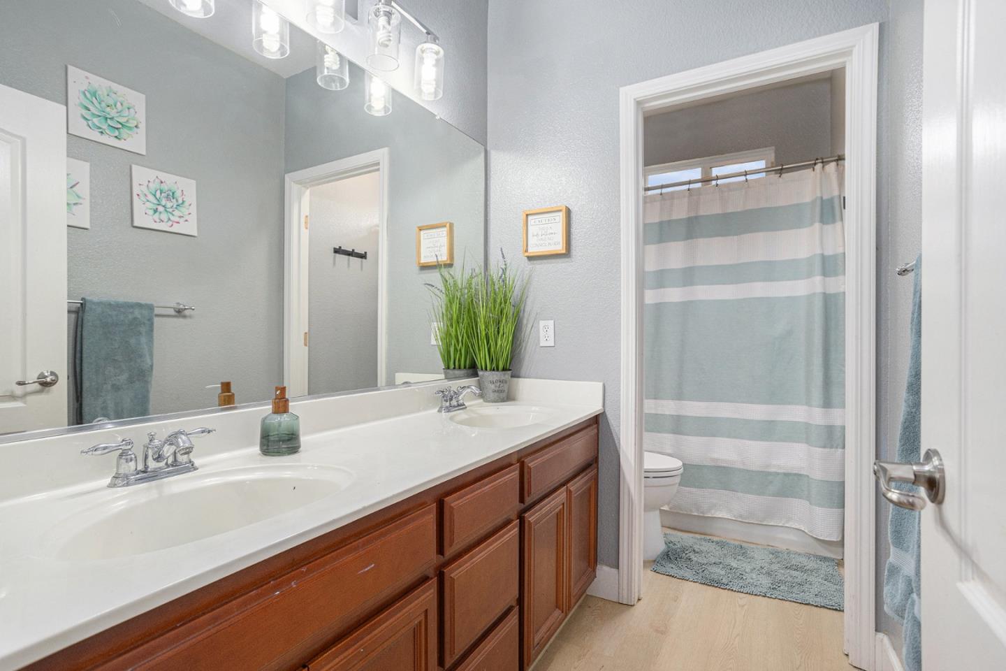130 Ridge Crest Court Oakley, CA 94561 - Photo 35 of 59 a bathroom with a sink and a mirror