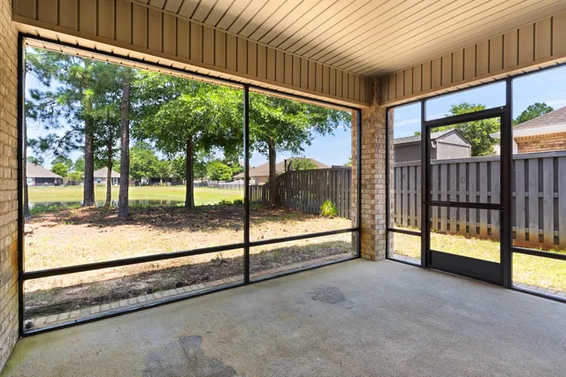 a view of a porch with a backyard