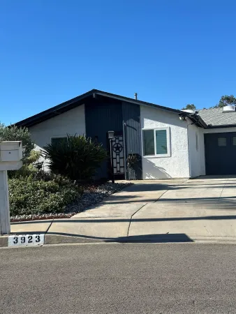a view of a house with a garage