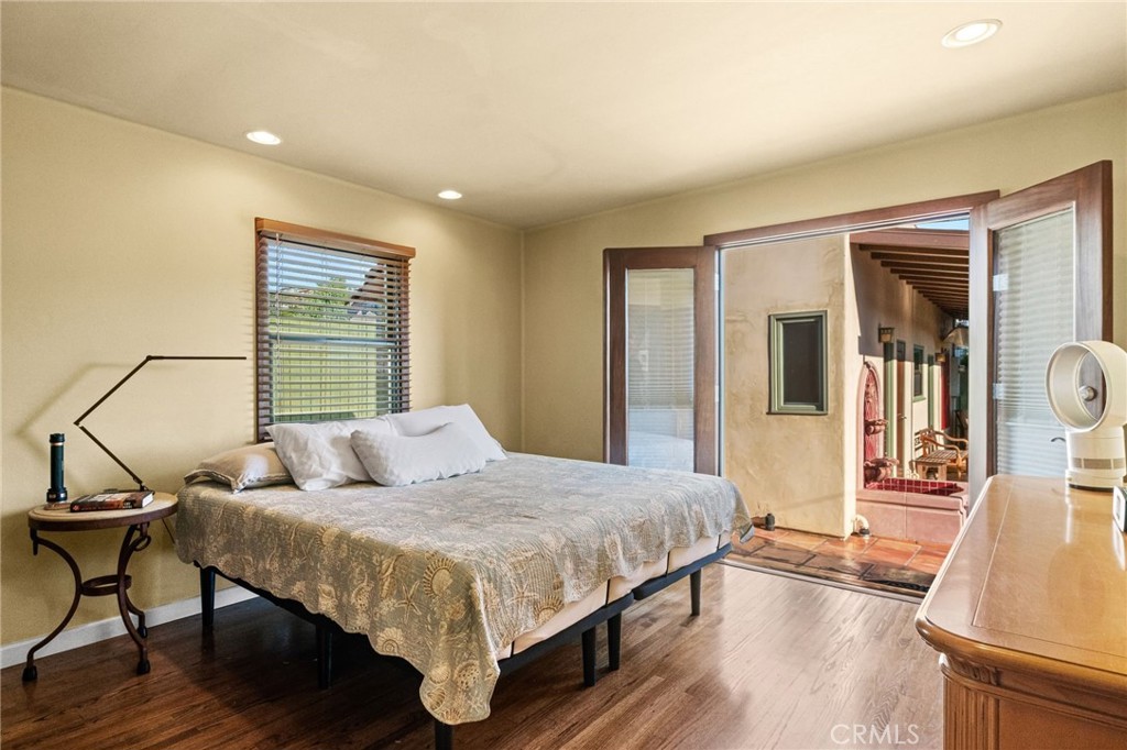 147 Trafalgar Lane San Clemente, CA 92672 - Photo 20 of 37 a bedroom with a bed and a table