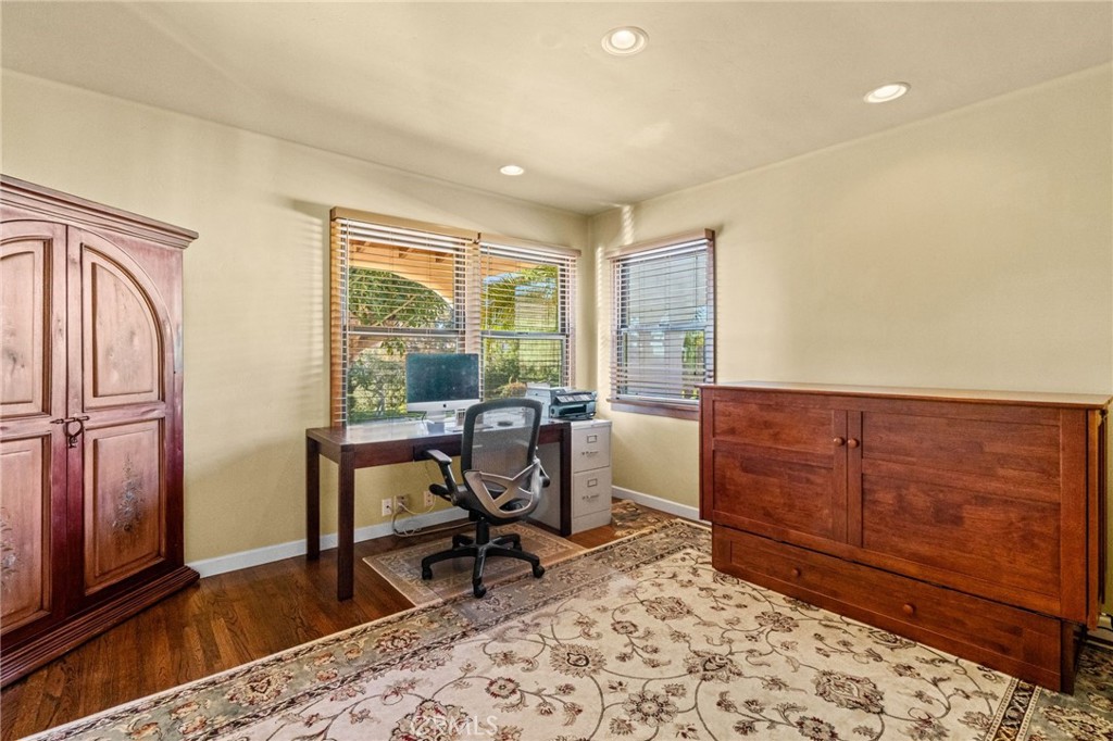 147 Trafalgar Lane San Clemente, CA 92672 - Photo 29 of 37 a view of a workspace with furniture and a window