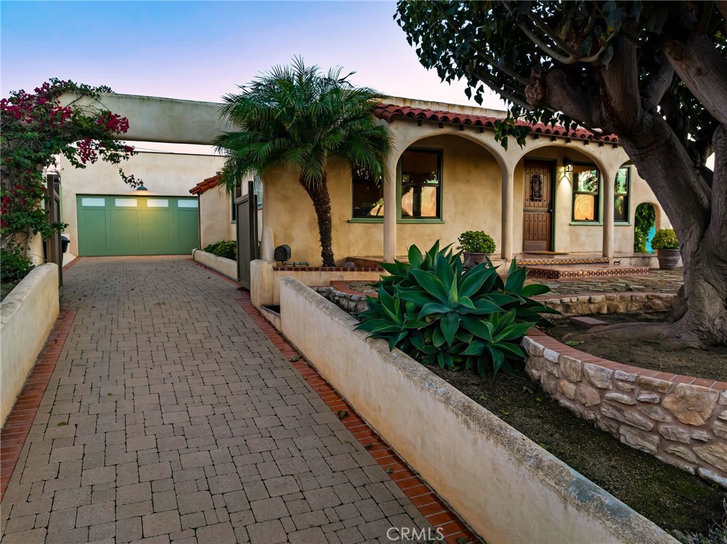 147 Trafalgar Lane San Clemente, CA 92672 - Photo 35 of 37 a front view of a house with garden