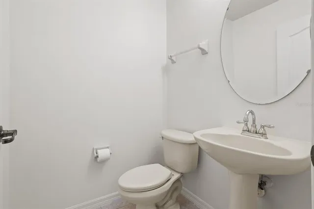 an empty room with wooden floor