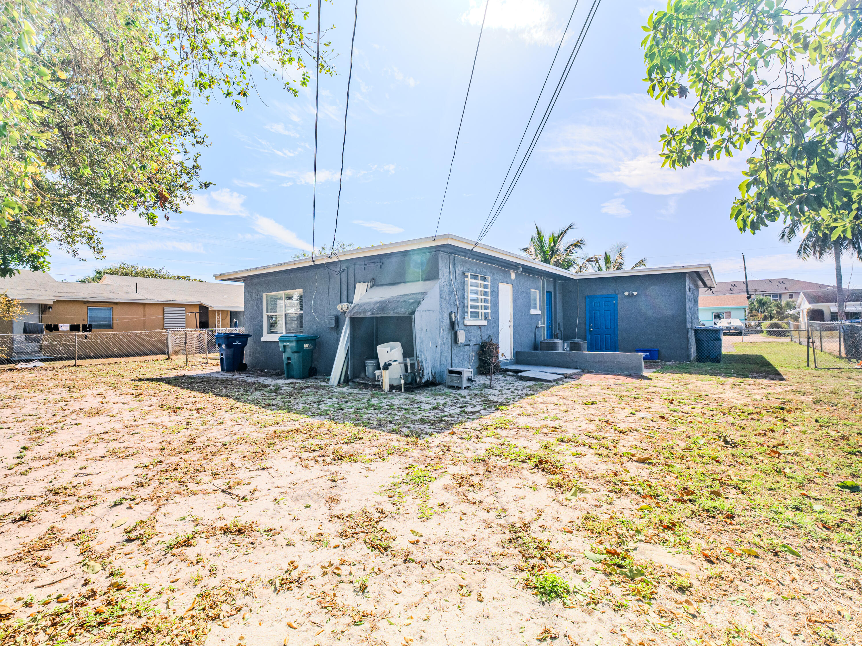 112 West 34th Street, Unit 1 Riviera Beach, FL 33404 - Photo 4 of 27 a view of a house with a yard