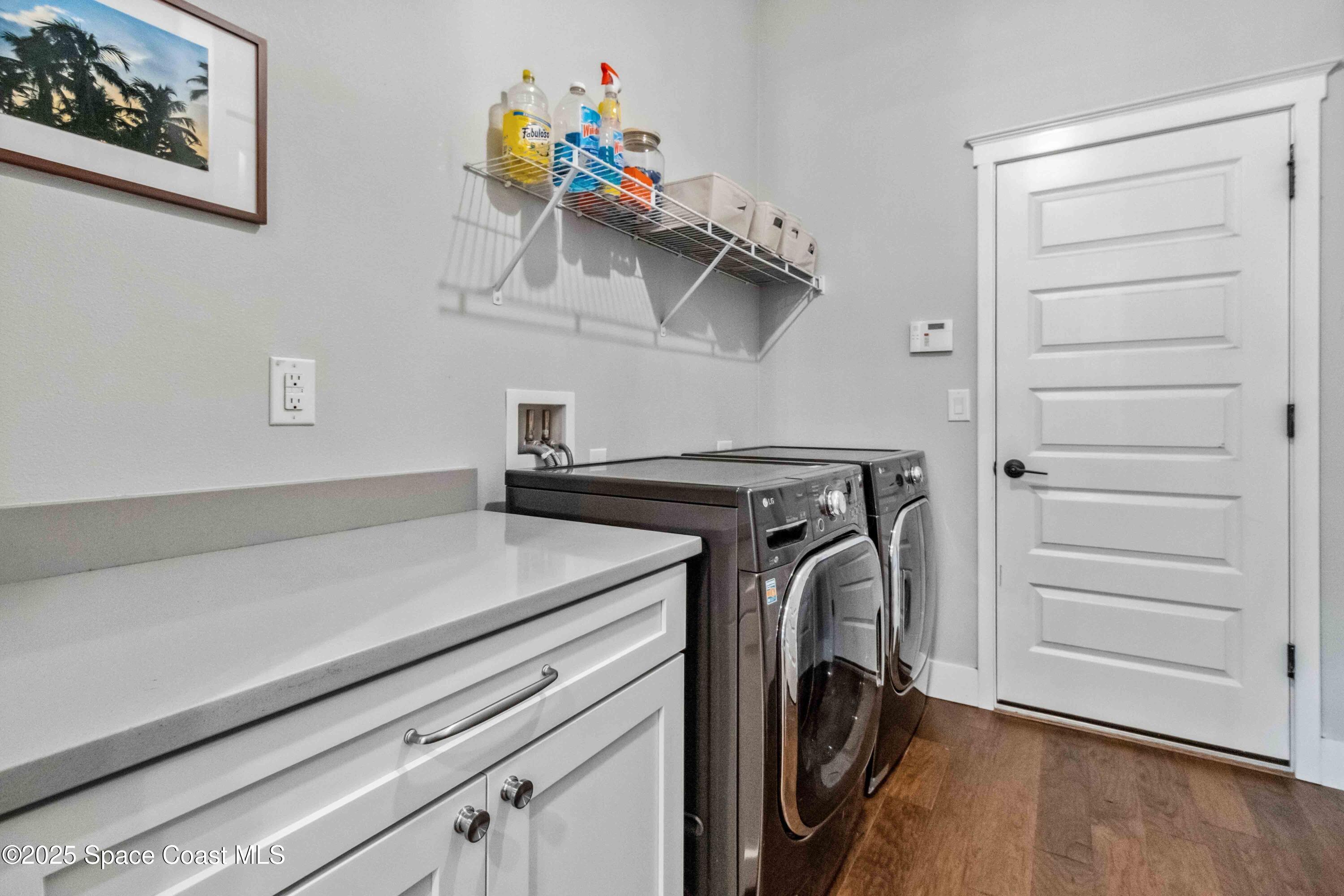 4620 Highway 1 Grant, FL 32949 - Photo 14 of 65 a utility room with dryer and washer