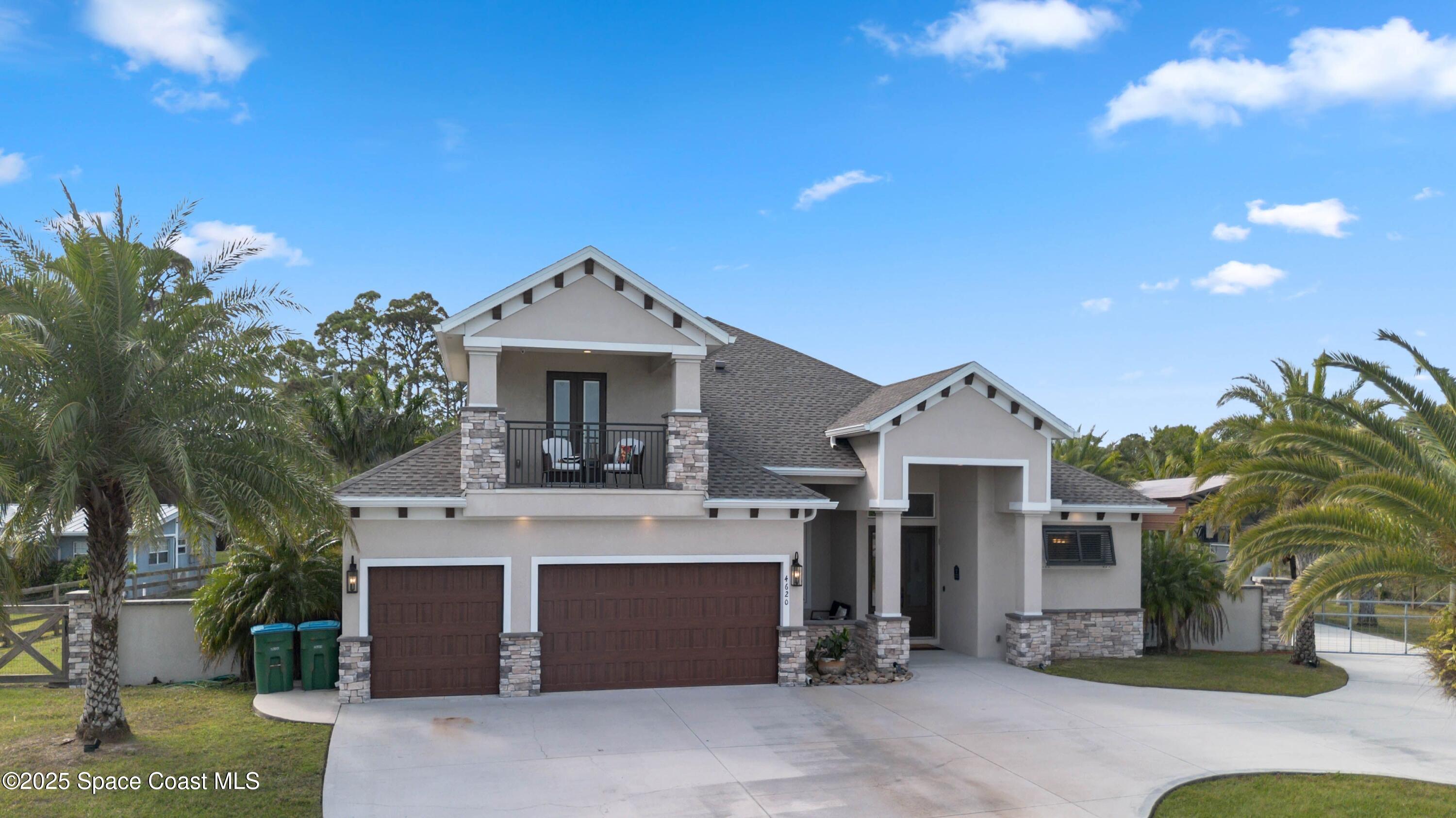 4620 Highway 1 Grant, FL 32949 - Photo 17 of 65 a front view of a house with a garden