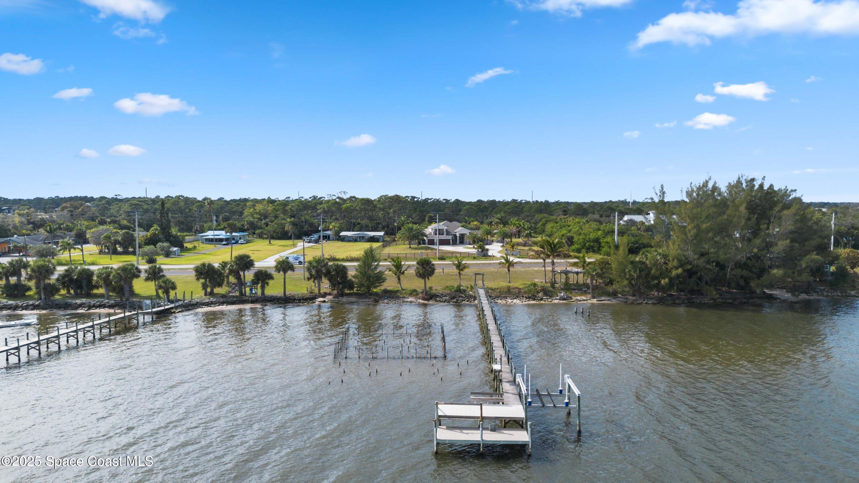4620 Highway 1 Grant, FL 32949 - Photo 2 of 65 a view of a lake with a mountain