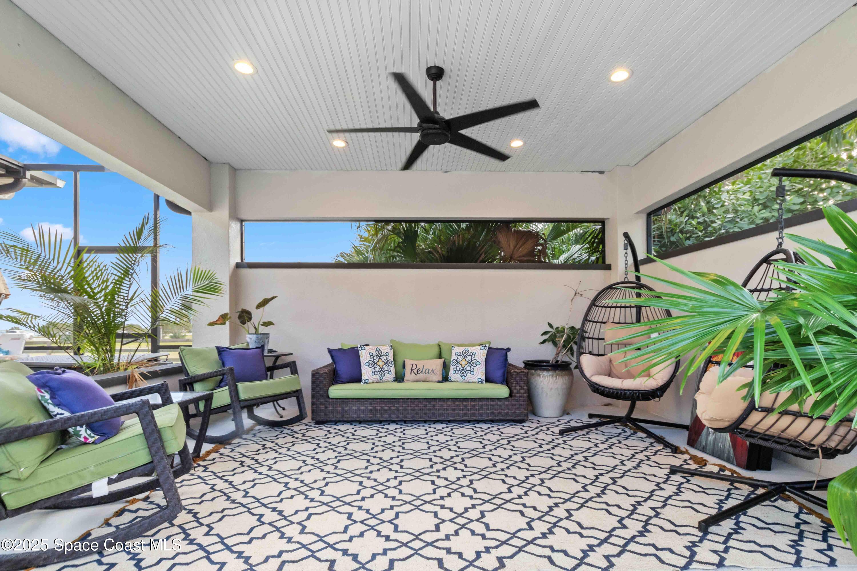 4620 Highway 1 Grant, FL 32949 - Photo 46 of 65 a living room with furniture and a potted plant