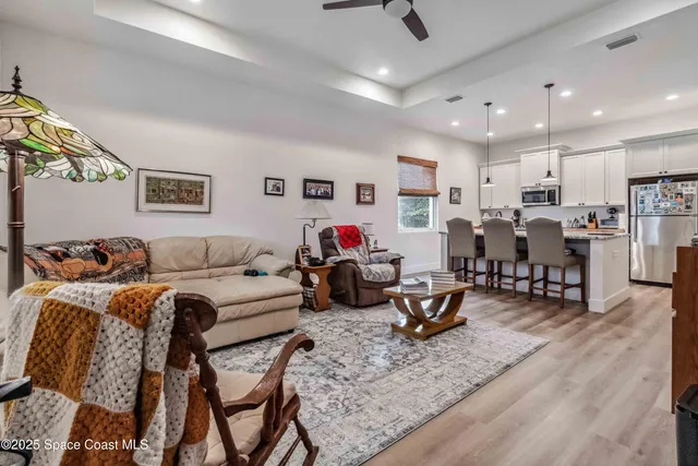 a bedroom with a bed and lamp