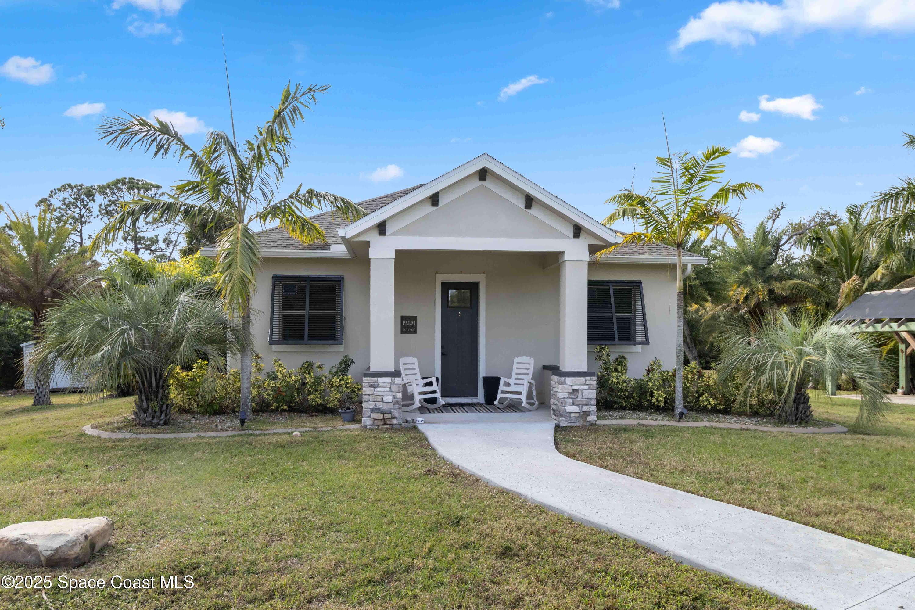 4620 Highway 1 Grant, FL 32949 - Photo 57 of 65 a front view of a house with garden