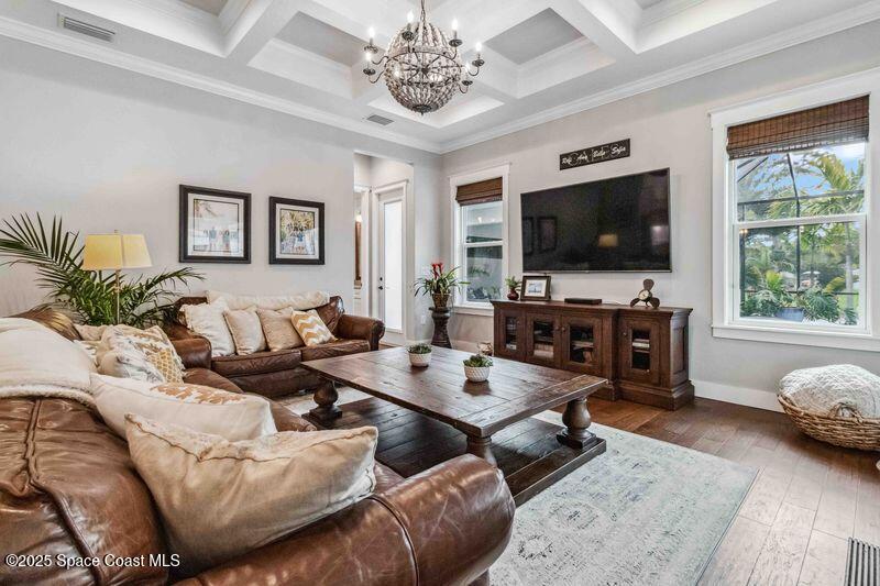 4620 Highway 1 Grant, FL 32949 - Photo 6 of 65 a living room with furniture and a flat screen tv