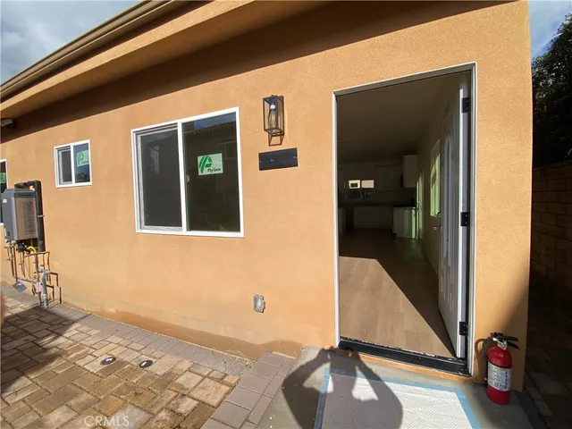 a backyard of a house with seating space