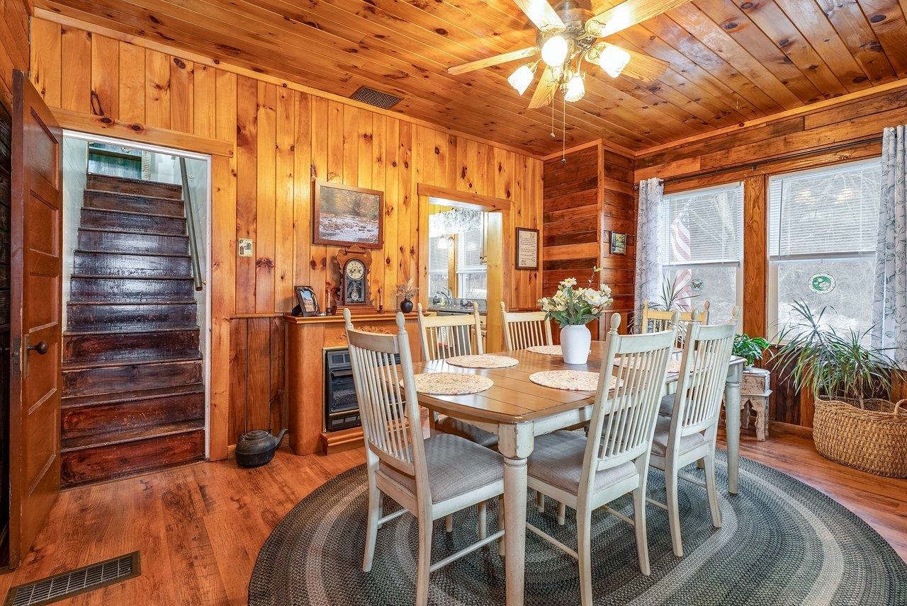8545 Sugar Grove Road Sugar Grove, WV 26815 - Photo 21 of 75 a view of a dining room with furniture window and outside view
