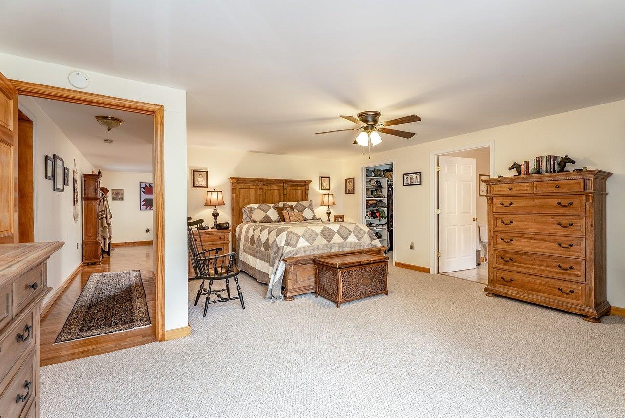 8545 Sugar Grove Road Sugar Grove, WV 26815 - Photo 26 of 75 a view of a livingroom with furniture and a ceiling fan