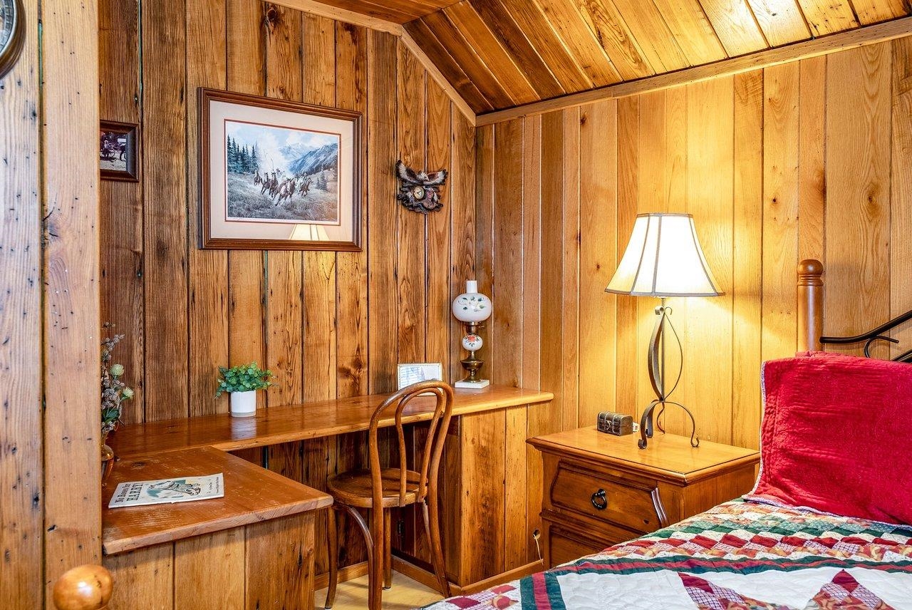 8545 Sugar Grove Road Sugar Grove, WV 26815 - Photo 47 of 75 a view of a dining room with furniture and chandelier