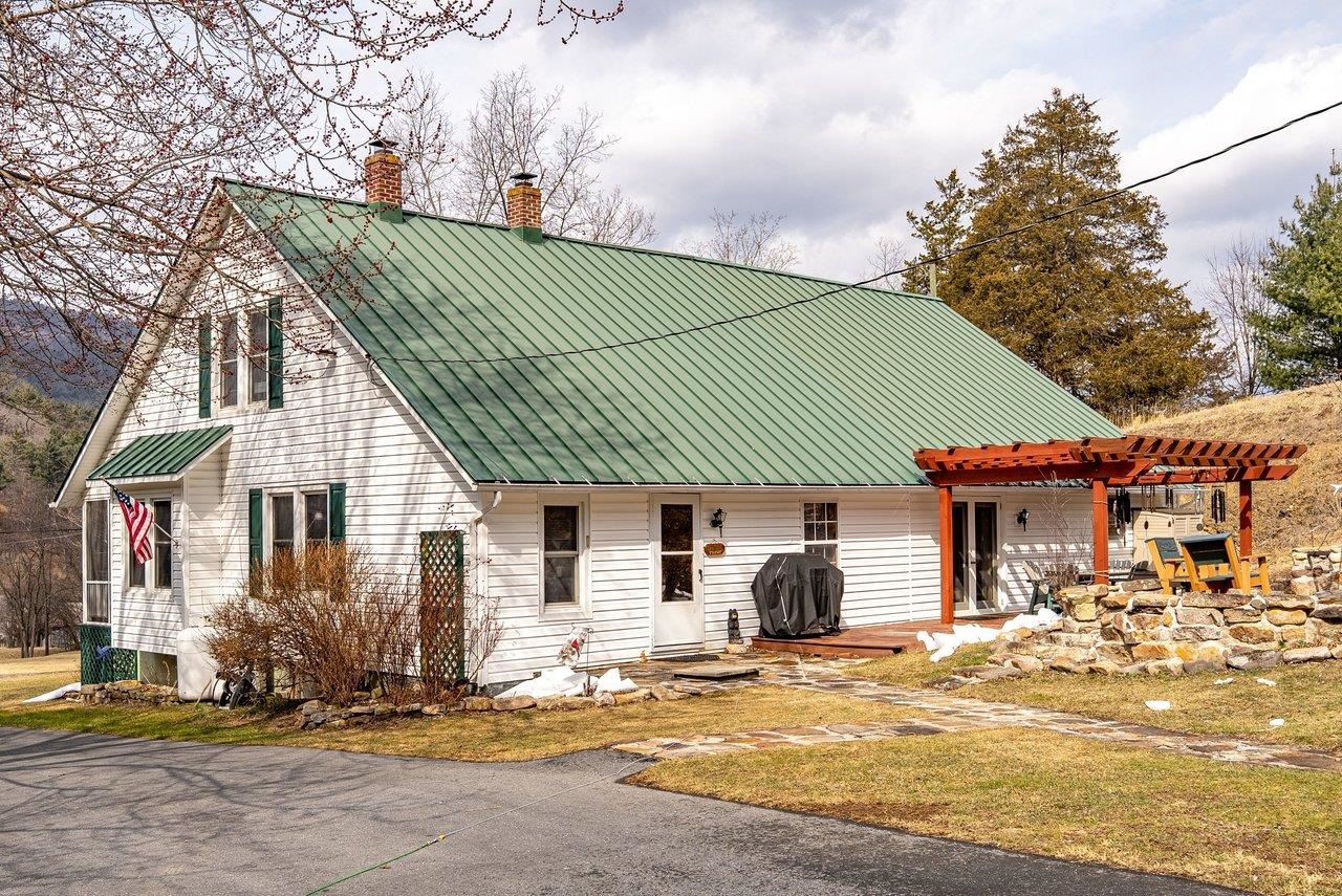 8545 Sugar Grove Road Sugar Grove, WV 26815 - Photo 63 of 75 a front view of a house with garden