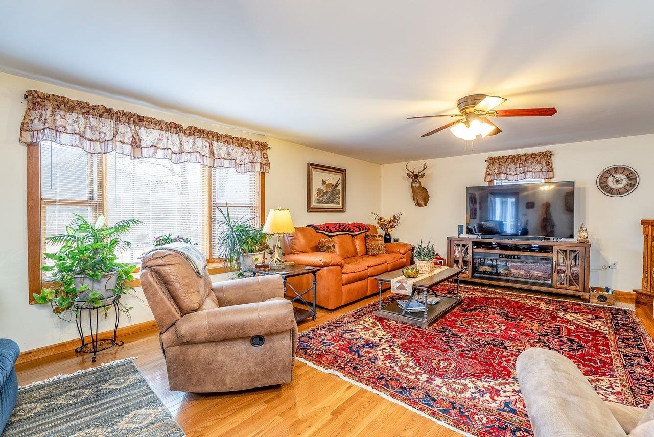 8545 Sugar Grove Road Sugar Grove, WV 26815 - Photo 7 of 75 a living room with furniture flat screen tv and a large window