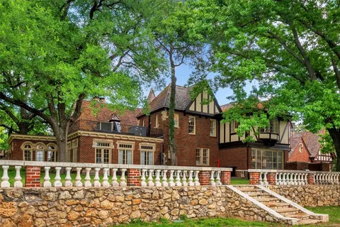 front view of a house with a garden