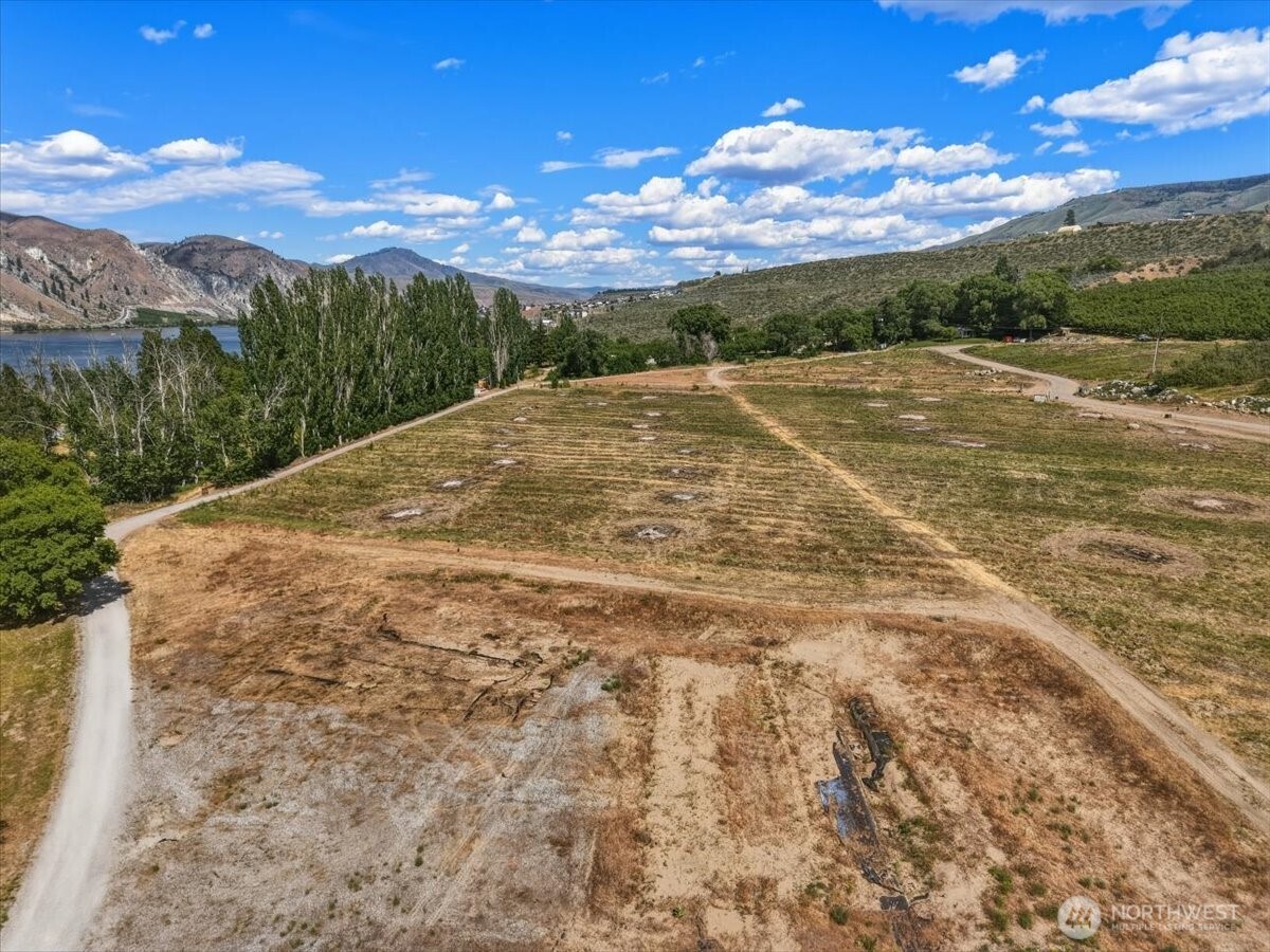 0 Lot 4 Silvest Road Orondo, WA 98843 - Photo 22 of 23 a view of a yard with an ocean