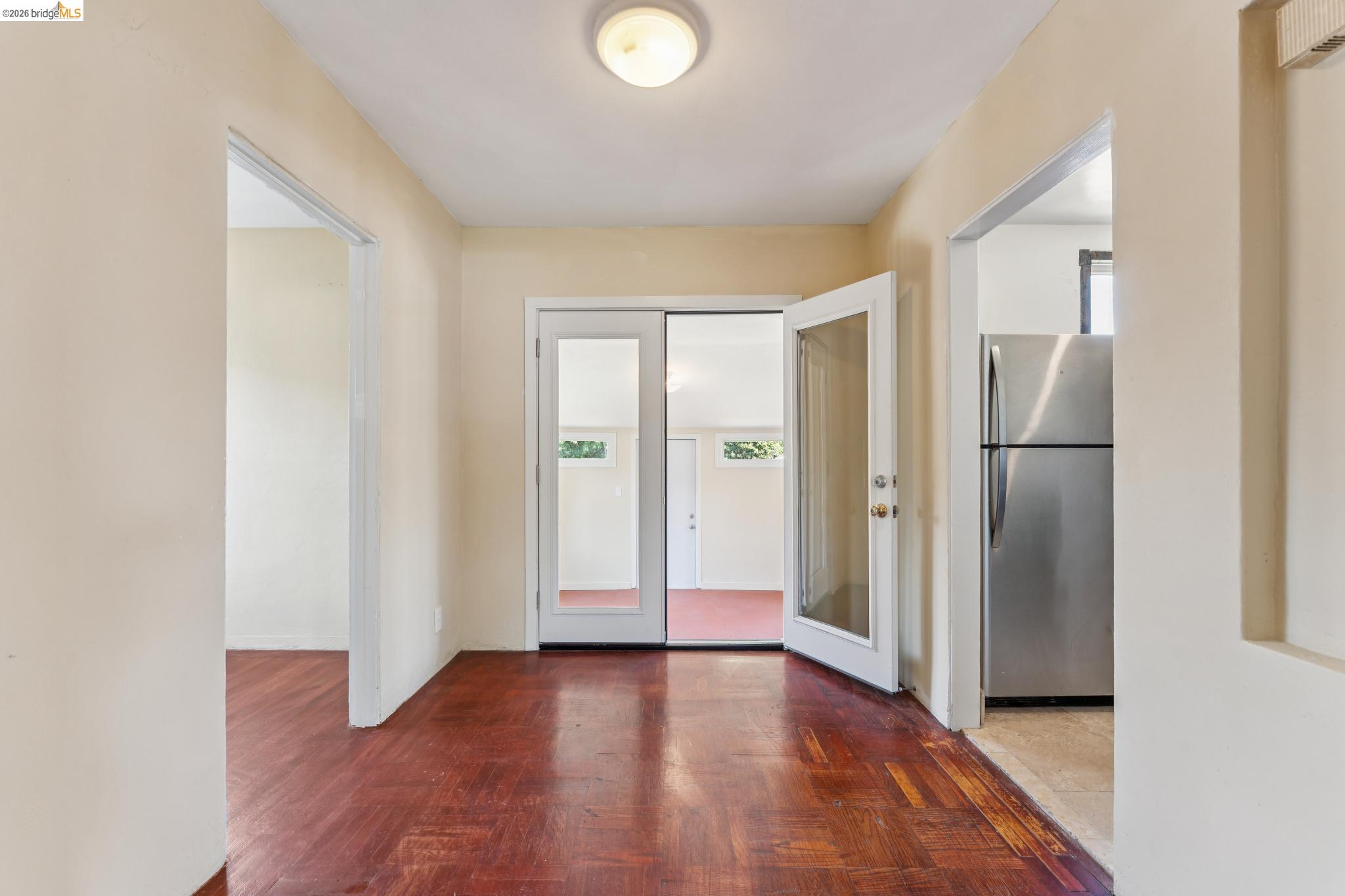 2879 Rheem Avenue Richmond, CA 94804 - Photo 12 of 45 Central hallway featuring rich wood-finish flooring