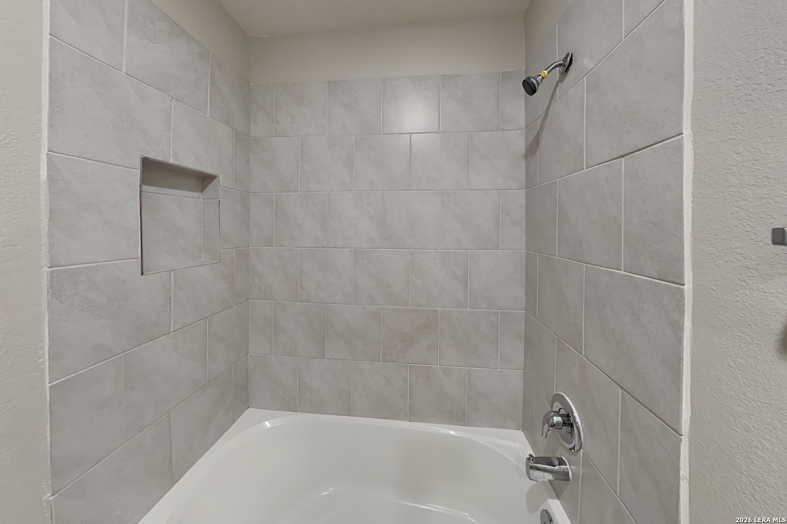 3022 Citron Garden Converse, TX 78109 - Photo 16 of 21 a close up of a bathtub in a bathroom
