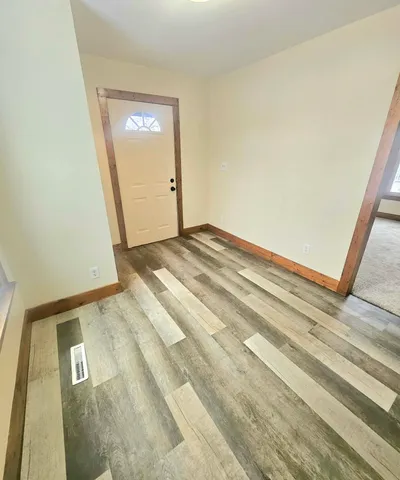 a view of an empty room and window