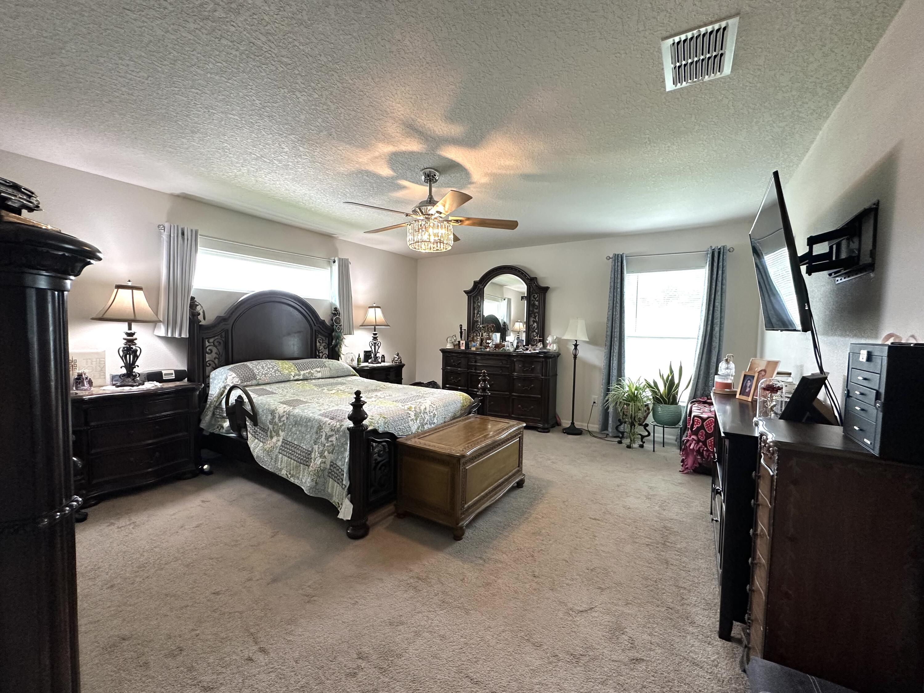15329 Southwest 65th Ter Road Ocala, FL 34473 - Photo 9 of 28 Master Bedroom with Ensuite Bathroom