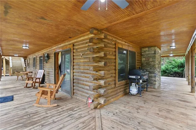a view of front door of house with stairs