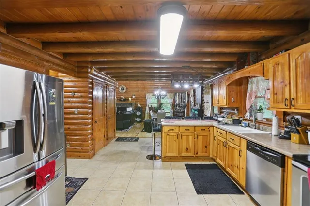 a bathroom with a sink mirror and toilet