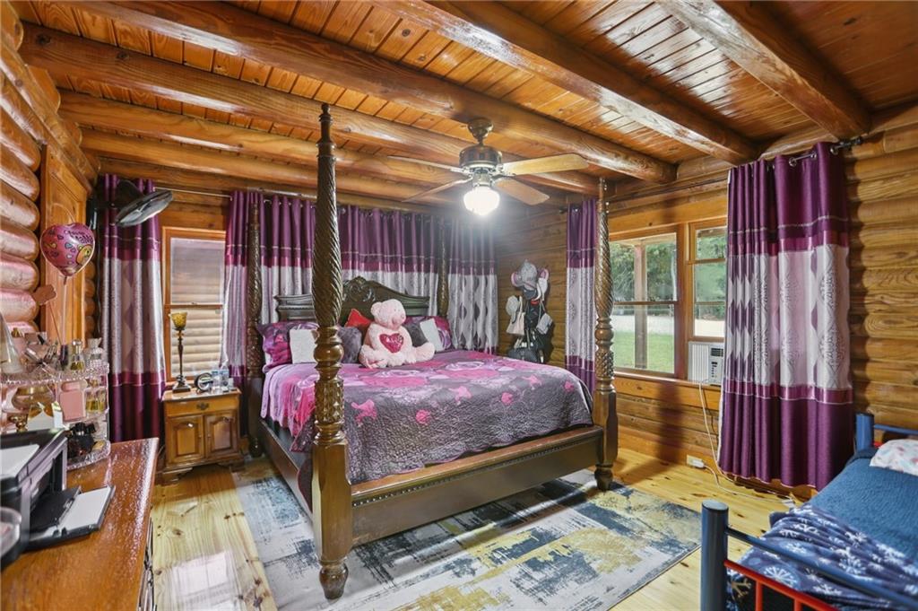 5467 Highway 162 Covington, GA 30016 - Photo 35 of 53 a bed room with a bed and a window