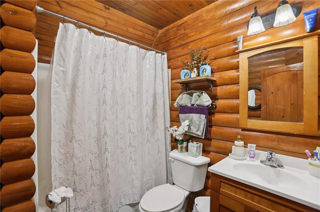 5467 Highway 162 Covington, GA 30016 - Photo 41 of 53 a bathroom with a sink toilet and shower