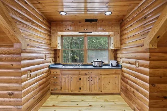 a view of parking garage with cars