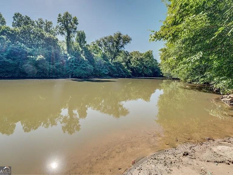5467 Highway 162 Covington, GA 30016 - Photo 52 of 53 a view of a lake with a mountain