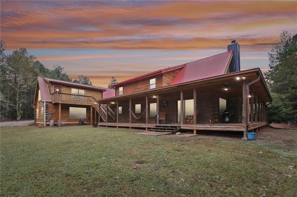 5467 Highway 162 Covington, GA 30016 - Photo 6 of 53 front view of a house with a yard