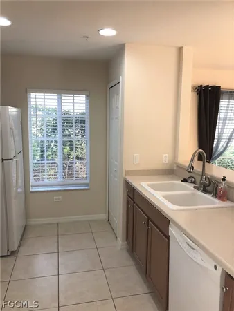 a bathroom with a sink a vanity and a mirror
