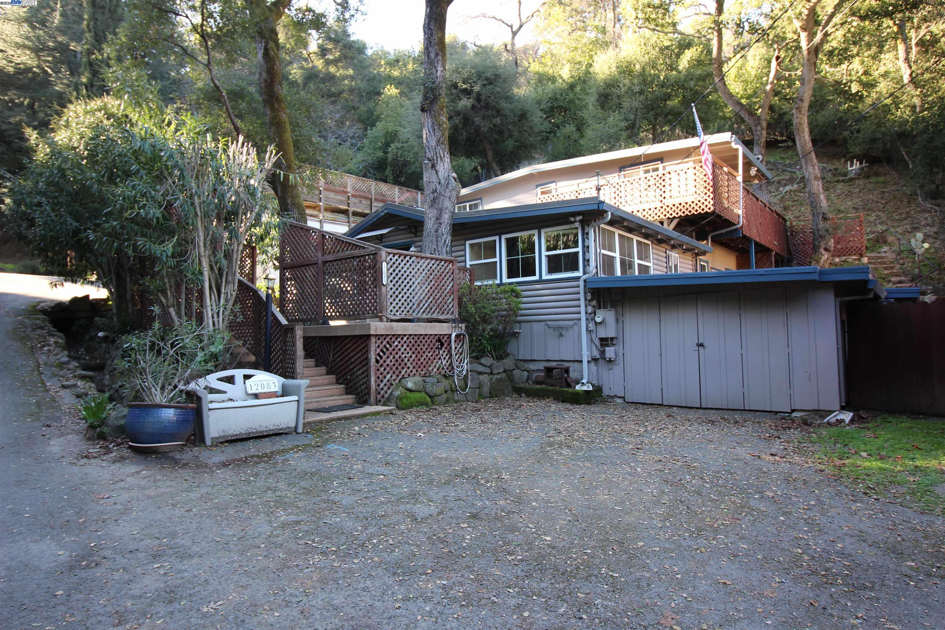 12083 Ruth Glen Sunol, CA 94586 - Photo 1 of 1 a view of a house with a cars park
