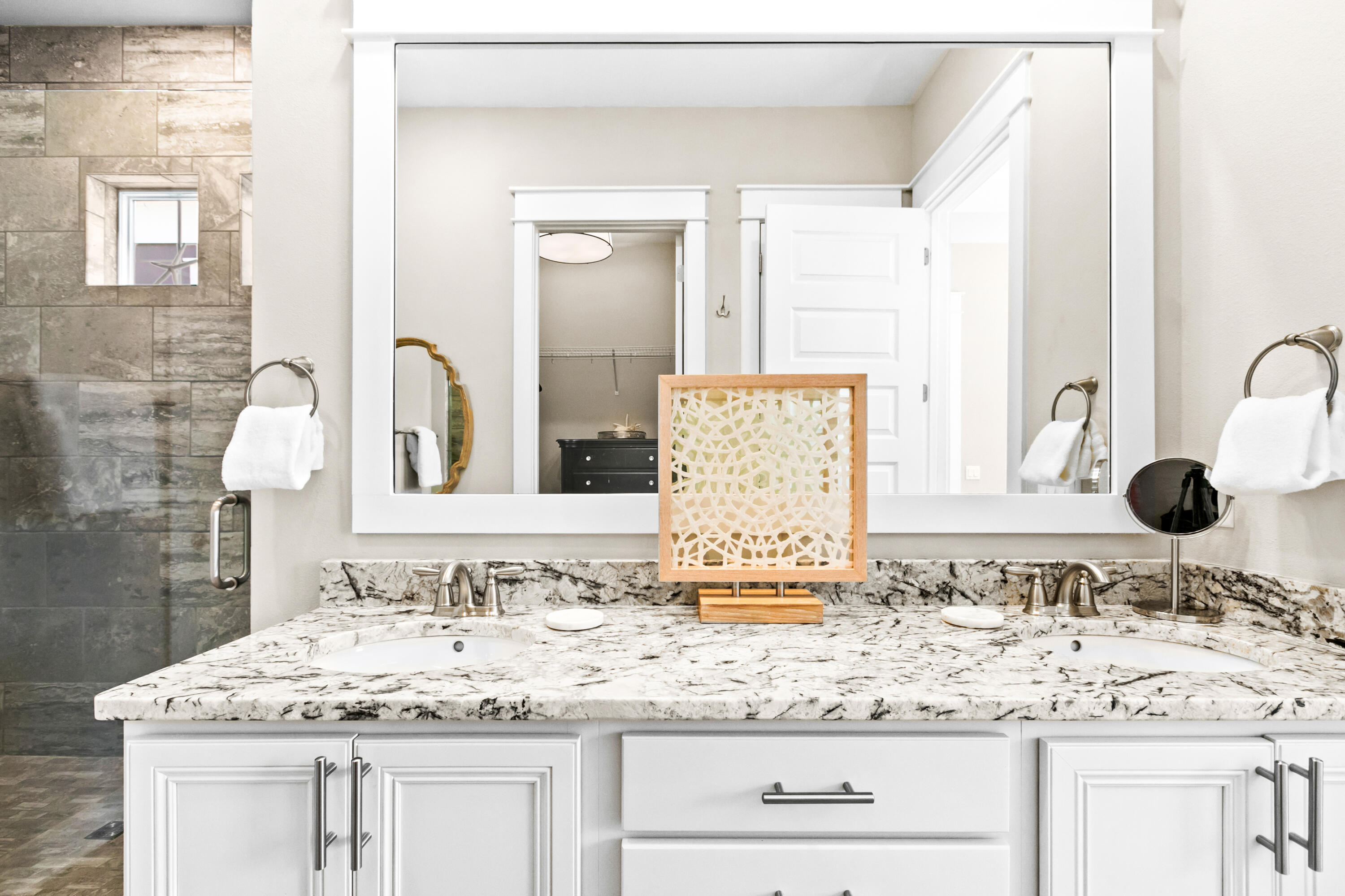111 East Milestone Drive, Unit C Inlet Beach, FL 32461 - Photo 18 of 37 a bathroom with a sink vanity granite and a mirror