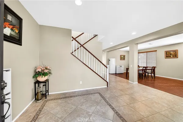 a view of livingroom with furniture and stairs