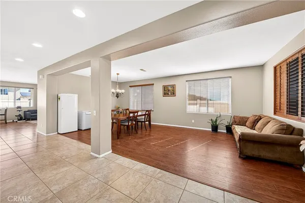 a view of livingroom with furniture and stairs